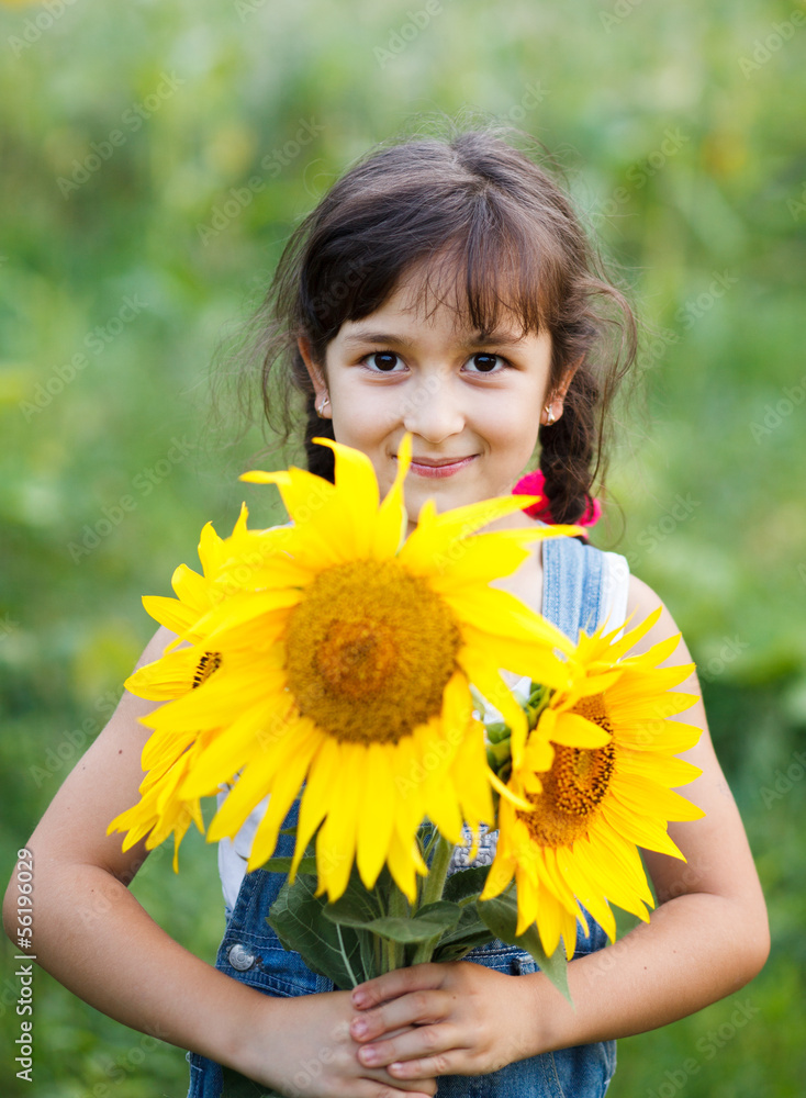 Beautiful little girl and sunflower Beautiful little girl and sunflower