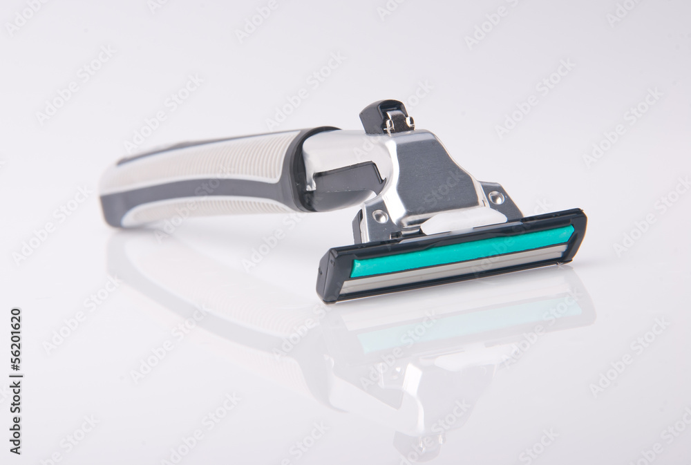 Safety shaver or razor on background Safety shaver or razor on background