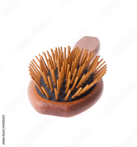 Wooden old comb on blackground