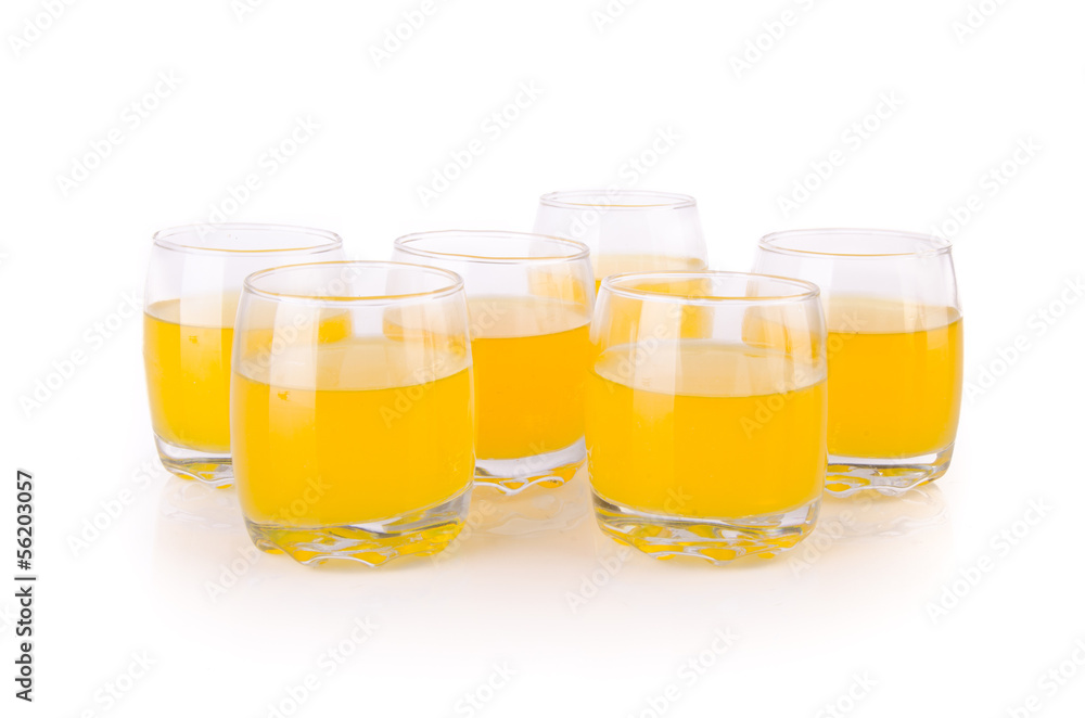 Orange juice in glasses on white background. Orange juice in glasses on white background.