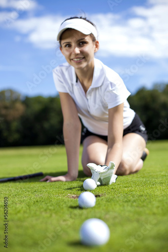 Pretty girl cheating on golf field
