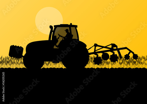 Agriculture tractor cultivating the land in cultivated country g