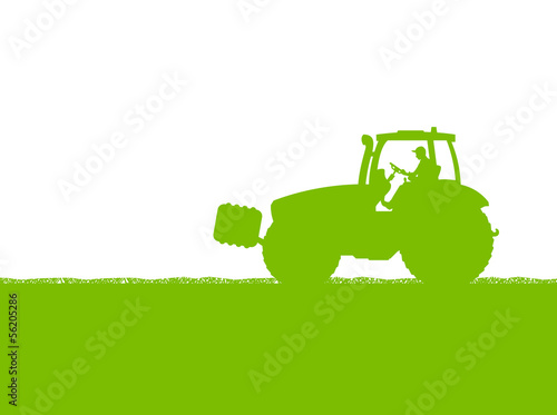 Agriculture tractor in cultivated country corn field landscape b