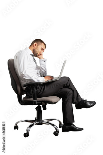 Canvas Print tired businessman sitting on office chair