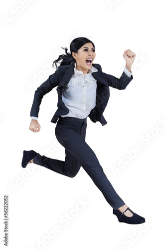 Business woman running in suit