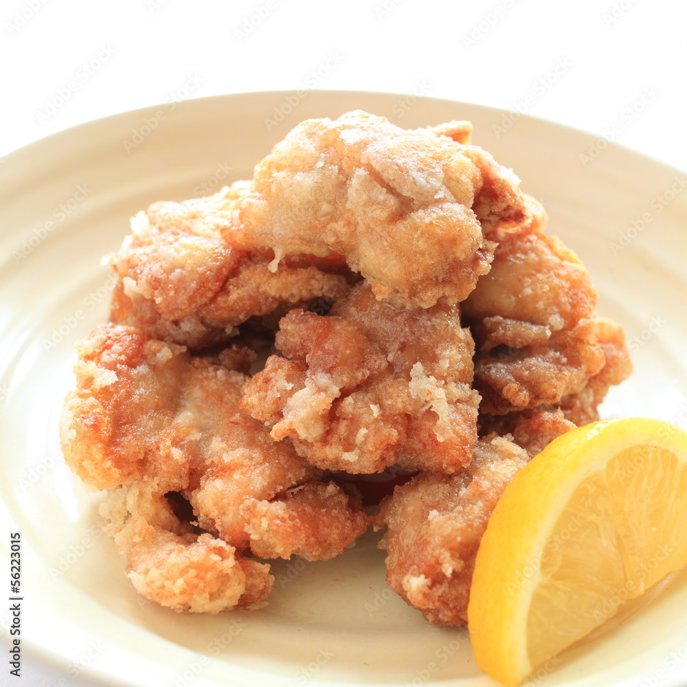 Close up Japanese Fried chicken with lemon on side Close up Japanese Fried chicken with lemon on side