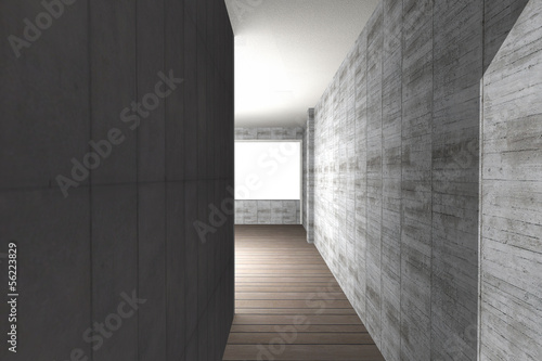 Interior with bare concrete wall and wood floor