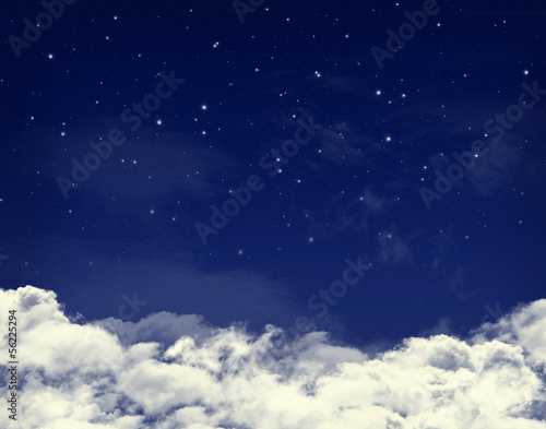 Clouds and stars in a night blue sky