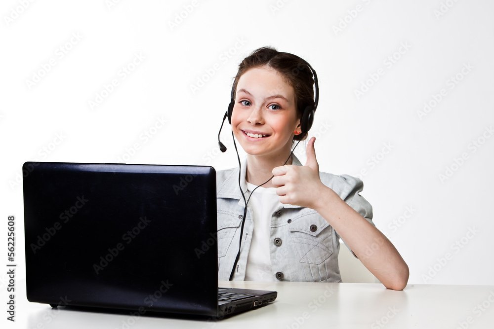 beautiful girl with a laptop and headset beautiful girl with a laptop and headset