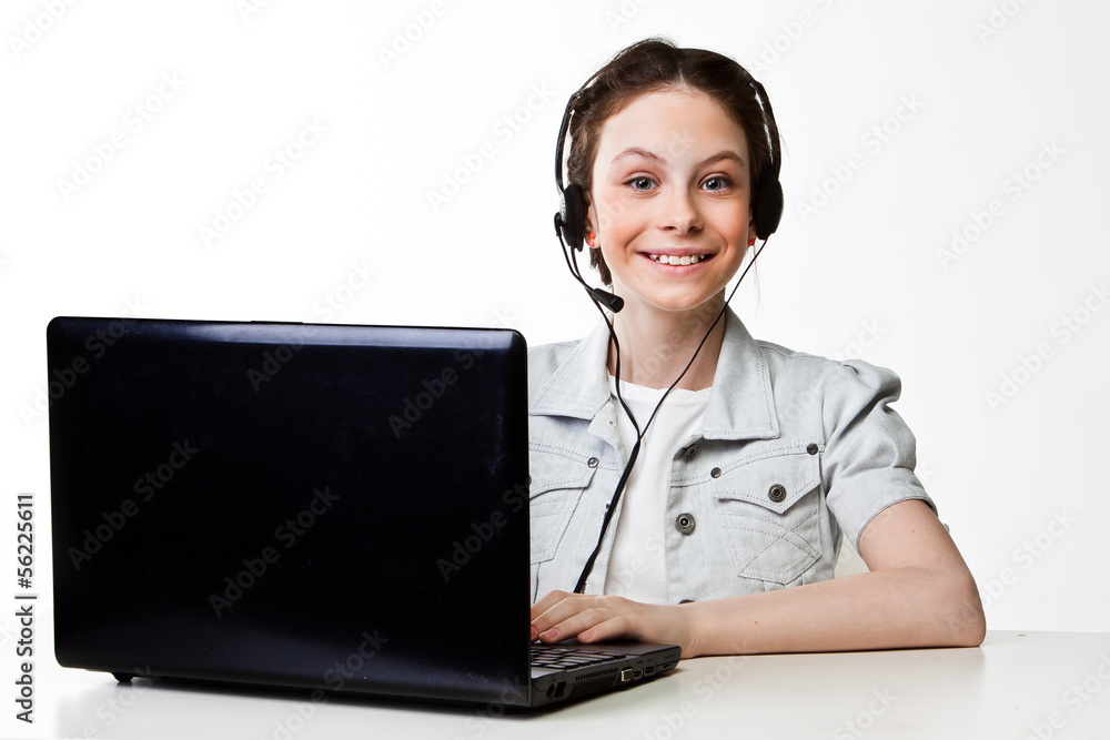 beautiful girl with a laptop and headset beautiful girl with a laptop and headset