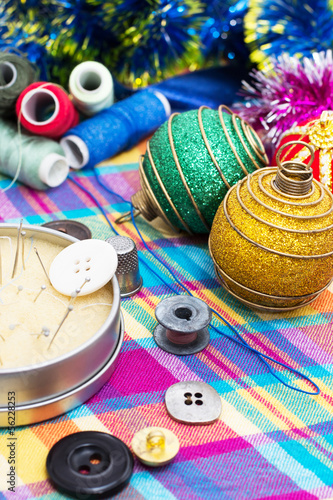 sewing tools and new year decorations photo