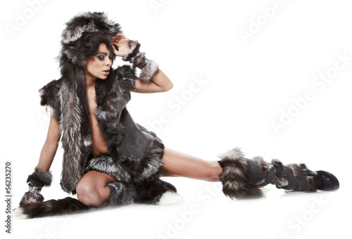 beautiful woman in barbarian costume at white background