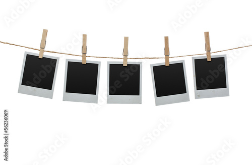 Blank photos hanging on the clothesline