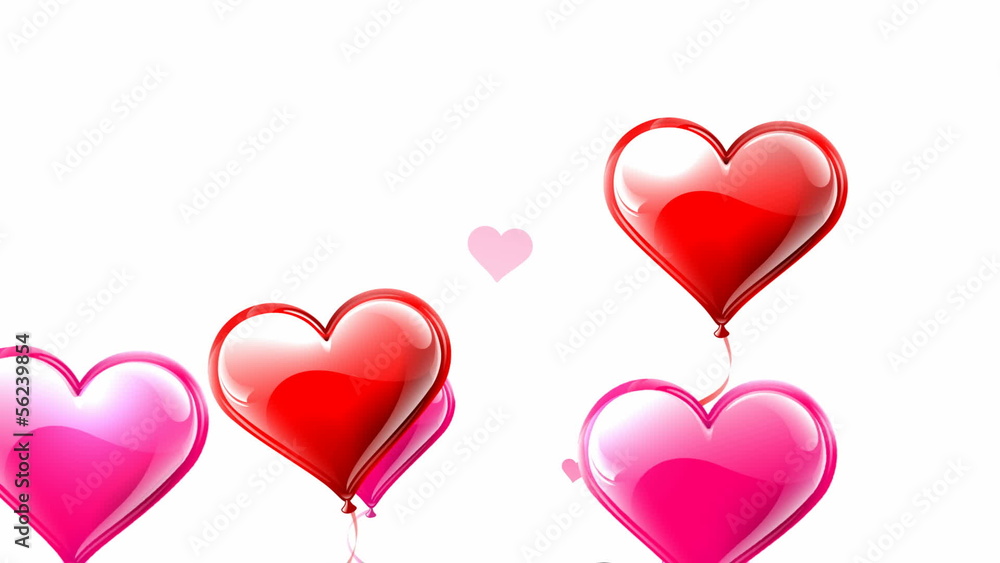Heart shaped balloons floating into the air Heart shaped balloons floating into the air
