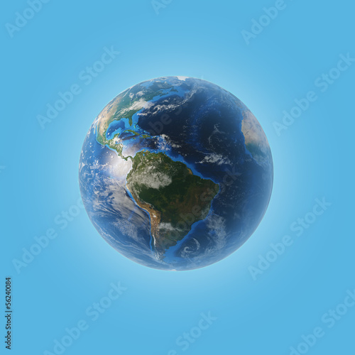 Planet earth with some clouds over a blue background © ImageFlow