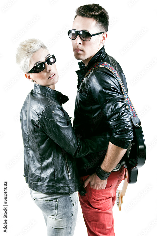 young couple with rocker outfit young couple with rocker outfit