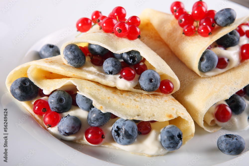 Pancakes with cream and fresh blueberries Pancakes with cream and fresh blueberries