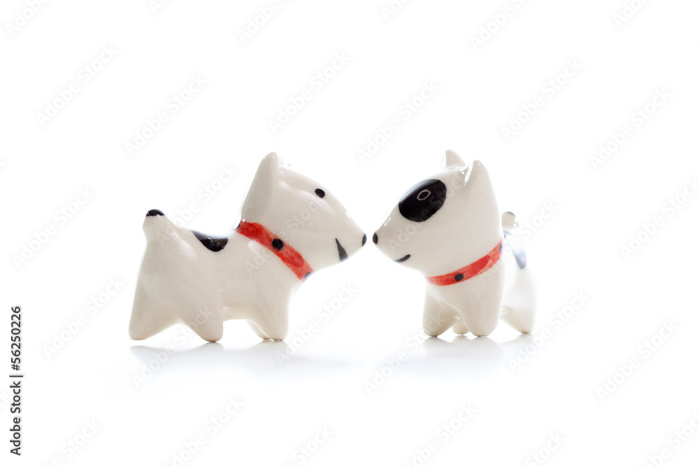 two Dog Figurine on White Background