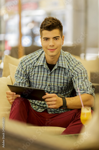 Young man with tablet