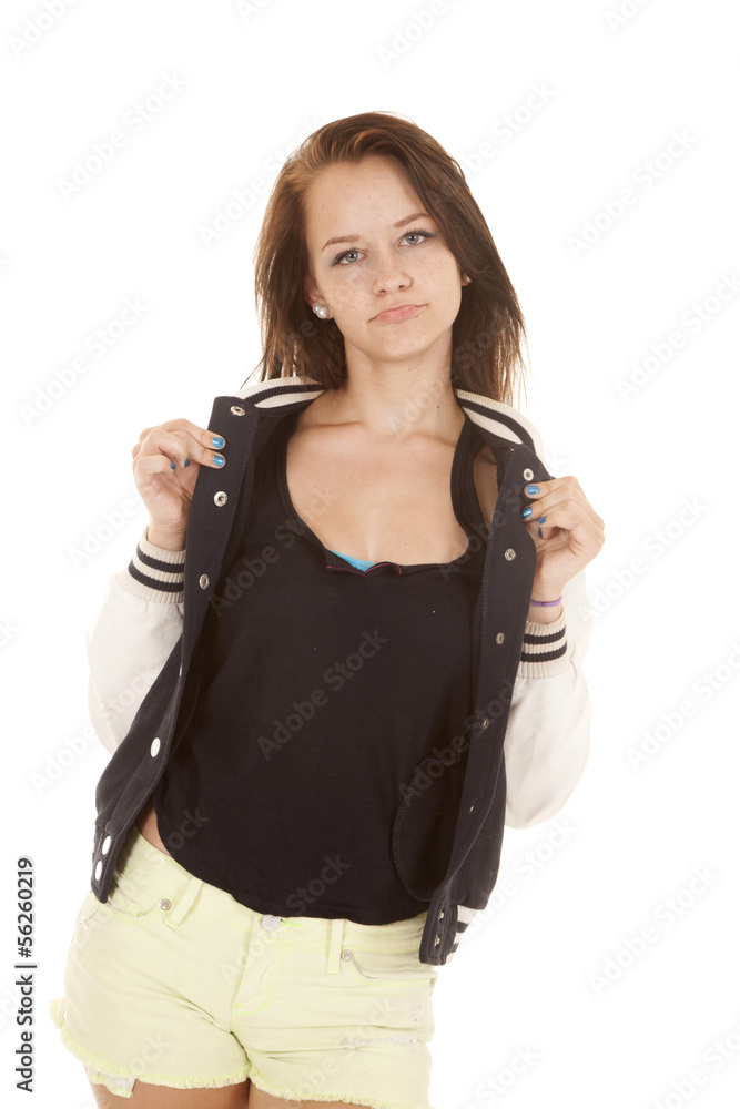 Fototapeta premium Girl holding colar of her jacket