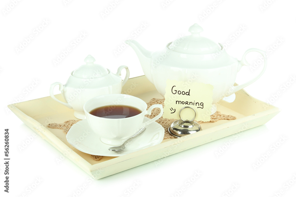 Cup of tea with cakes on wooden tray isolated on white Cup of tea with cakes on wooden tray isolated on white