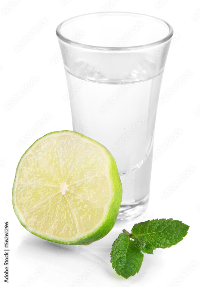 Tequila in glass isolated on white Tequila in glass isolated on white