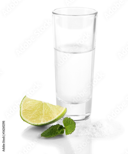 Tequila in glass isolated on white