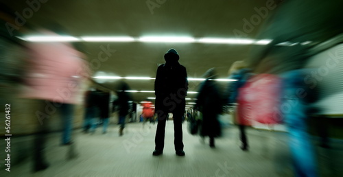 Black silhouette standing in crowd photo