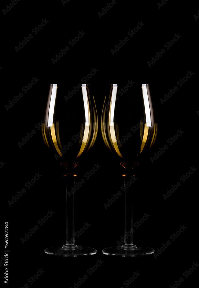 Wine glass silhouette on black background.