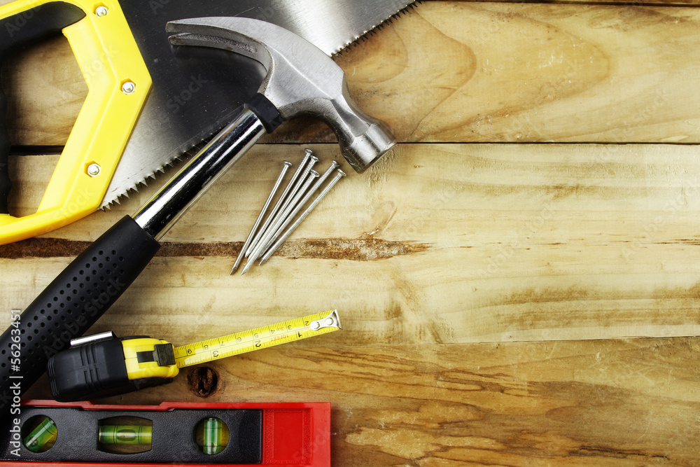 Carpentry work tools on wood background. Copy space Carpentry work tools on wood background. Copy space