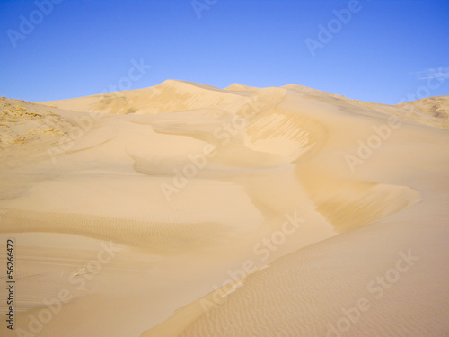 Wet sand dunes after the rain