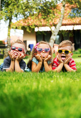 Trio kids showing their tongues