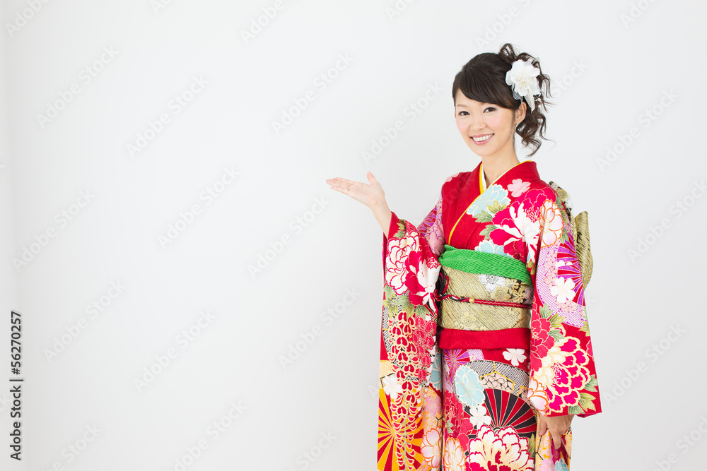 Beautiful asian kimono woman on white background Beautiful asian kimono woman on white background