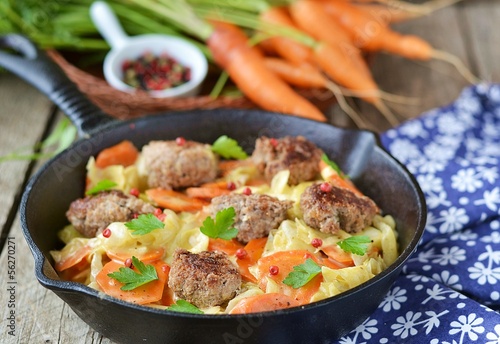 braised vegetables with meat balls.