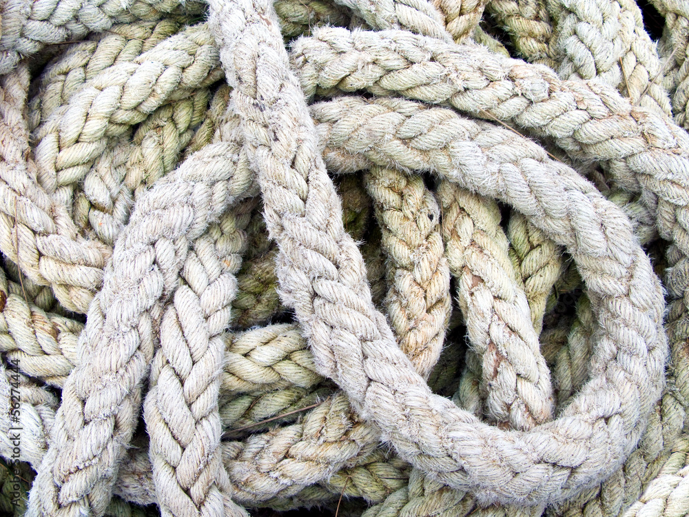 pile of used and old thick ship ropes
