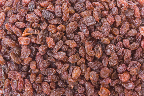 Crimson Raisins background texture close up detail.