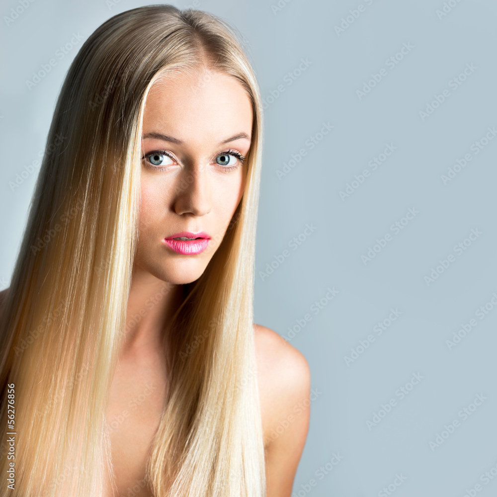 Naklejka premium Beautiful young woman with a long hair