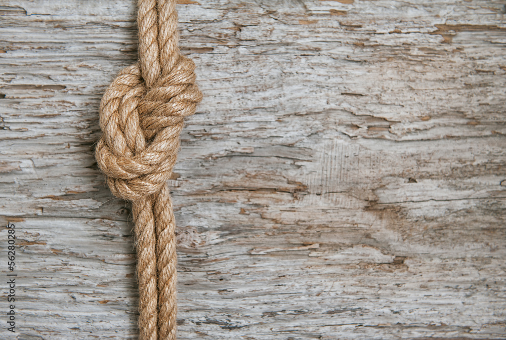 Fototapeta premium Ship rope and wood background