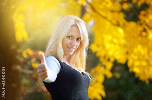 Girl in the autumn forest