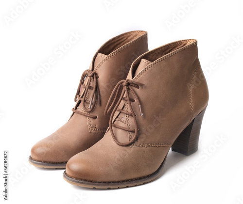 Elegant pair of woman's shoes isolated on a white background