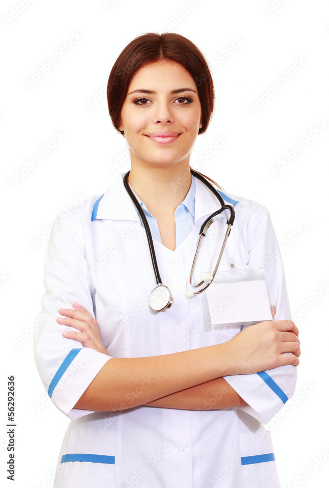 Beautiful young happy doctor over white background Beautiful young happy doctor over white background