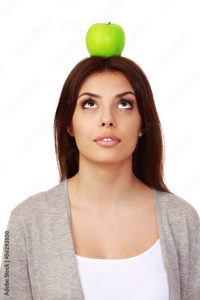 happy woman holding an apple over white background happy woman holding an apple over white background