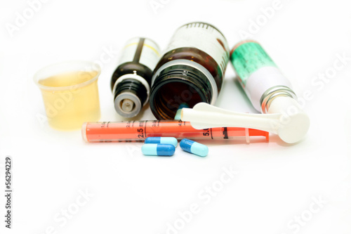 Different pharmacological preparations - tablets, syringes, syru