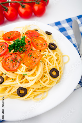 Pasta sliced with cherry tomatoes