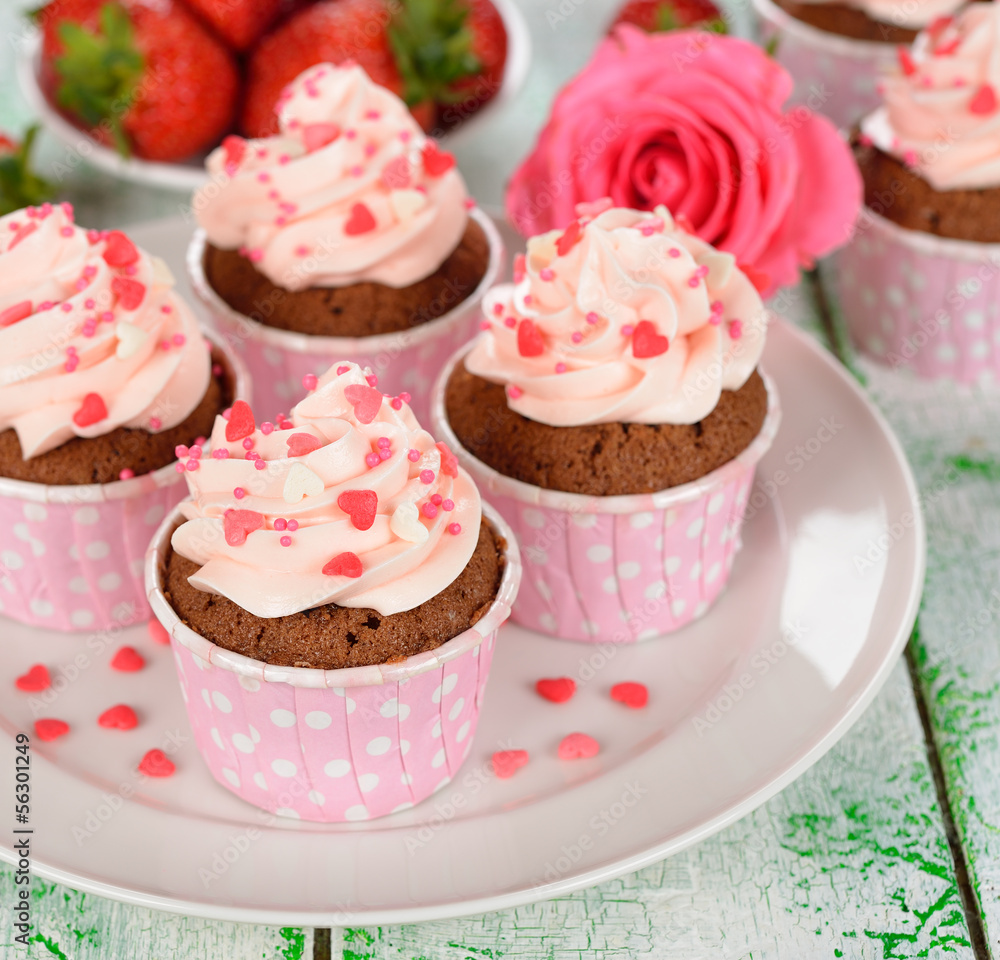 Chocolate cupcakes with pink cream
