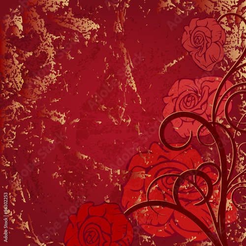 Beautiful corner vignette with red roses on the old background