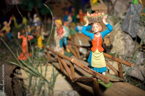 Woman carry basket fruit in bridge