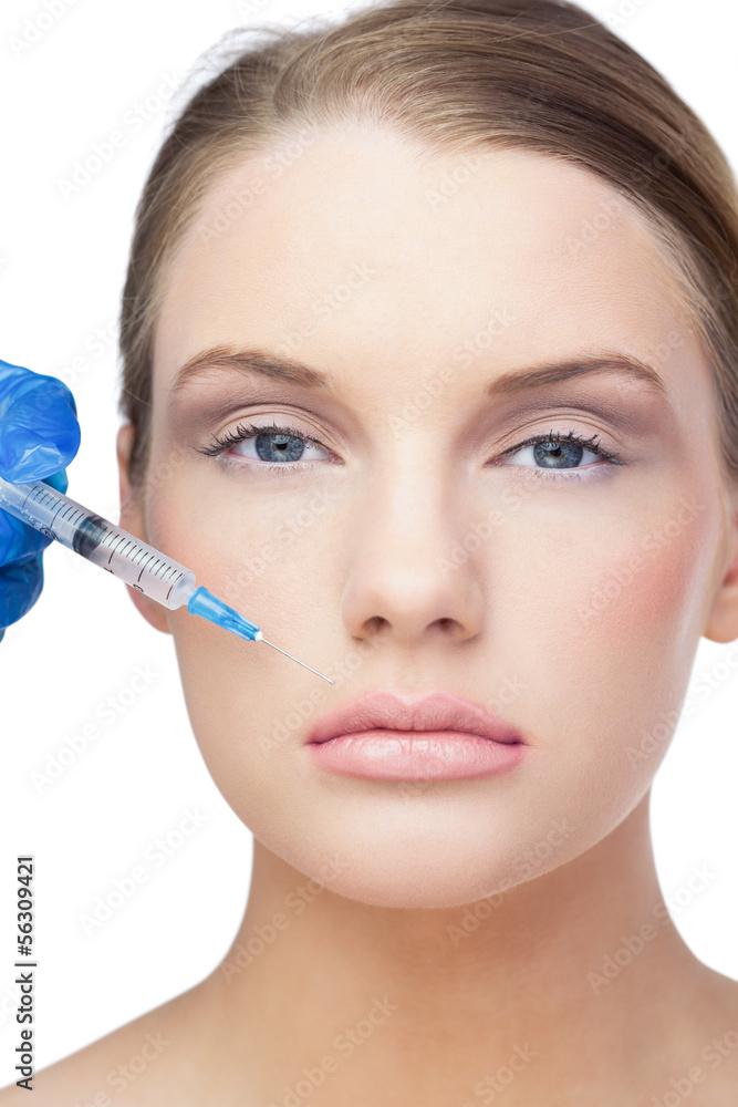 Calm beautiful blonde having injection above the lips Calm beautiful blonde having injection above the lips