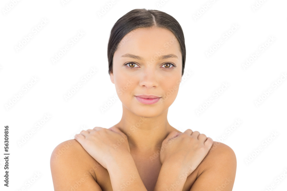 Attractive woman hands on shoulder smiling at camera Attractive woman hands on shoulder smiling at camera