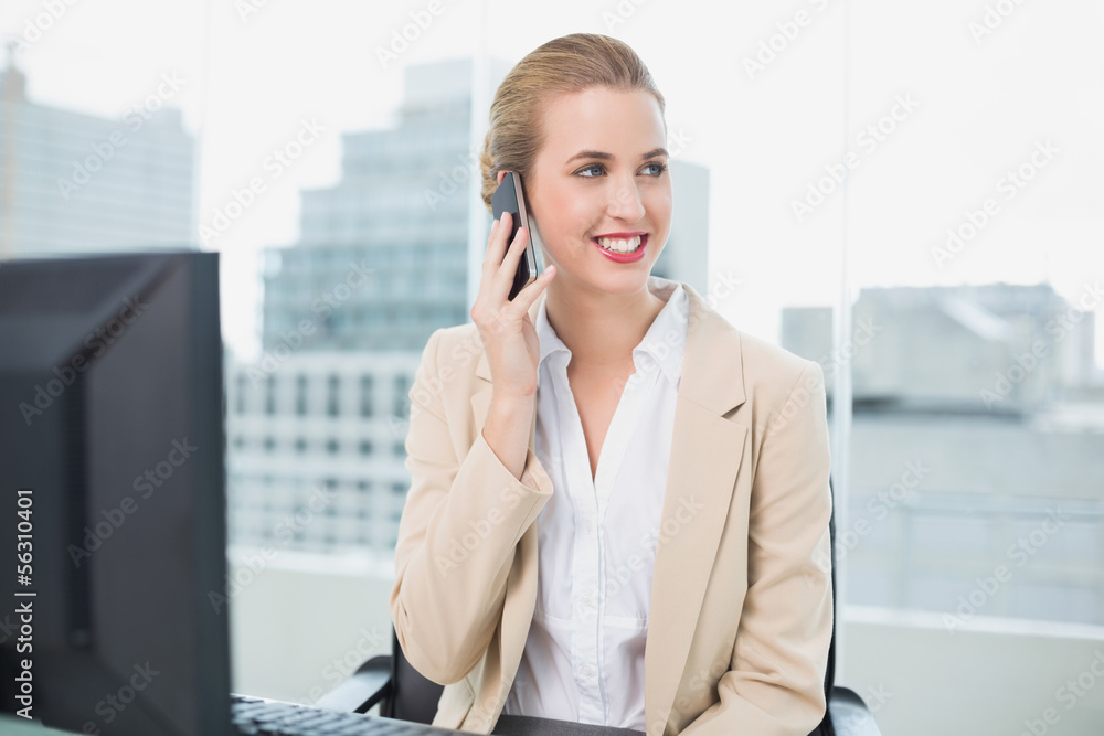 Happy attractive businesswoman on the phone Happy attractive businesswoman on the phone